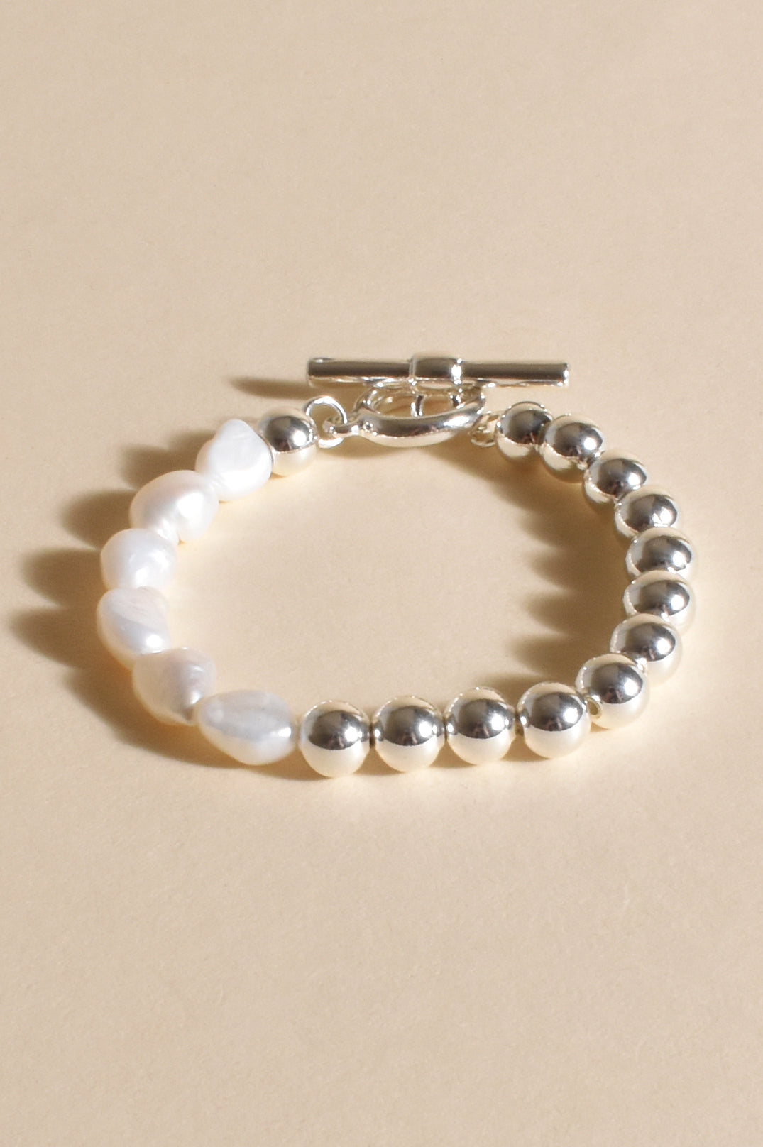 Adorne Half Pearl Metal toggle Bracelet - Silver